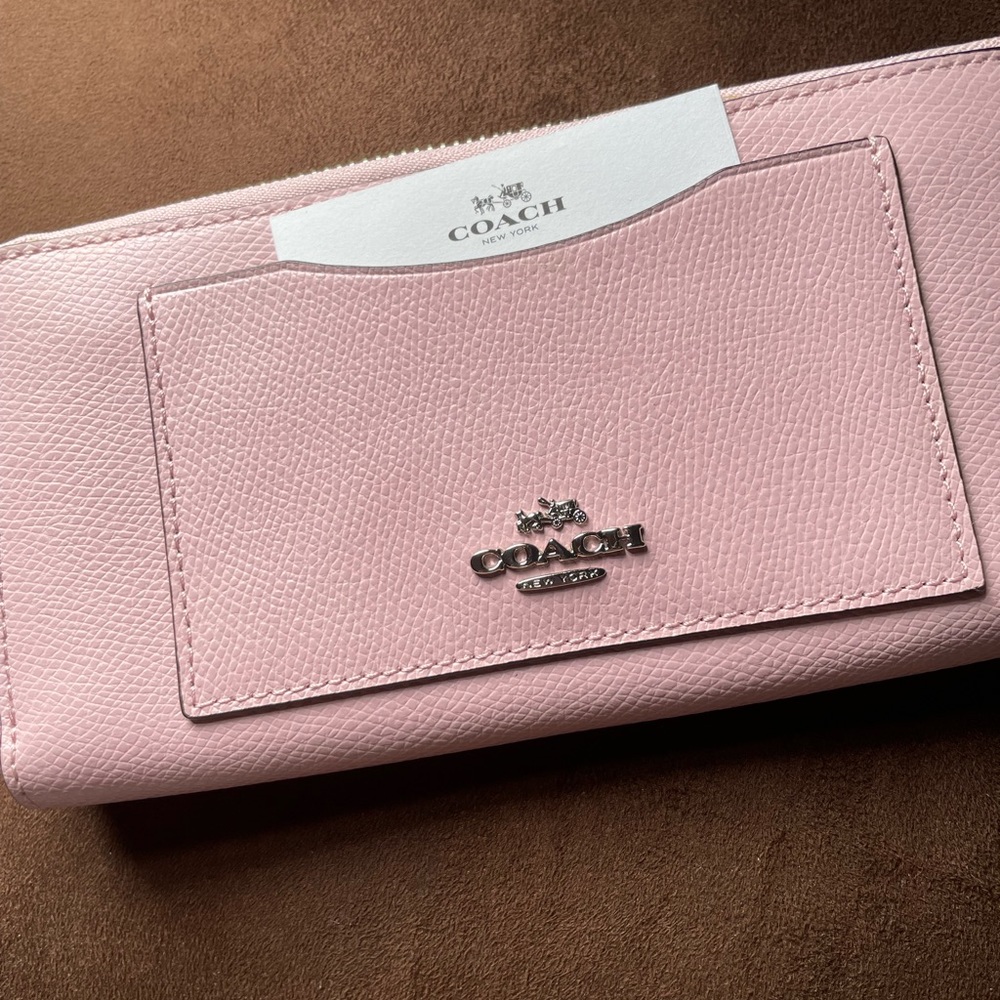 COACH
Coach Pink Leather Zip Around Wallet